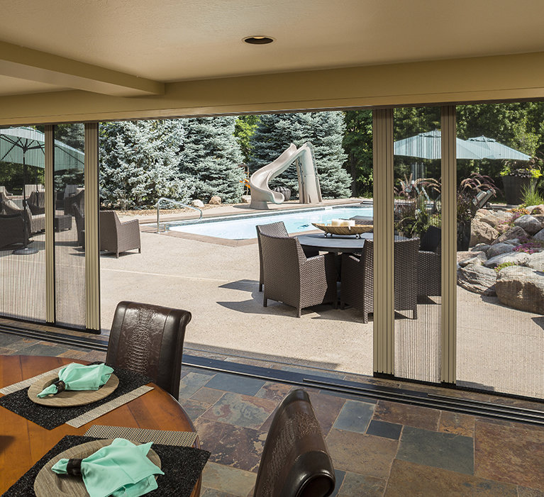 A RETRACTABLE SCREEN FOR WINDOWS AND DOORS IS THE ANSWER